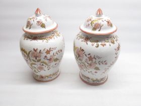 Pair of C20th Portuguese Faience baluster vases and covers and pointed knop finial, H34cm