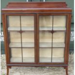 C20th mahogany display cabinet, galleried back above two astragal glazed doors on square