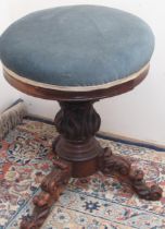 Victorian adjustable piano stool, circular upholstered top on three carved outsplayed legs