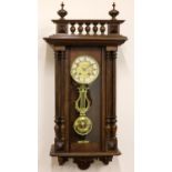 C20th continental walnut Vienna quarter striking wall clock, moulded case with spindle gallery and