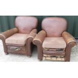 Pair of brown leather upholstered club type armchairs with sprung seats, turned wooden feet and