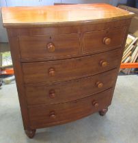 Victorian mahogany bow front chest of two short and three long cock beaded drawers on turned feet