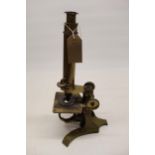C19th lacquered brass microscope on triform base, no visible maker, H37cm