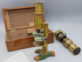 Two early C20th lacquered students brass microscopes, one with original fitted mahogany box, H18.5cm