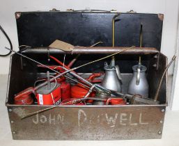 Eleven various oilers in metal tray painted John Drewell and black japanned metal circular box