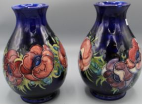 Moorcroft Pottery: pair of Anemone pattern ovoid vases with flaring necks, tube lined with pink to