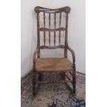 Victorian painted as rosewood rocking chair, with dished top rail, spindled turned back and rush