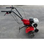 Honda FG320 petrol rotavator with 6 wheel blades. in very good order, complete with hand book