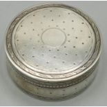 Continental silver circular pill box, with dot decoration in leaf clasped reeded bands, engine