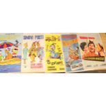 Collection of Soviet era Eastern European Disney, Norman Wisdom and other movie posters, max 71cm