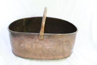 Large brass oval pan with fixed handle. L57cm H24cm D26cm. Copper warming pan, and large copper