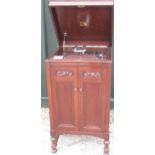 HMV oak cased cabinet gramophone, with two carved and moulded panel doors on vase turned tapering