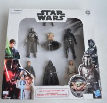 Hasbro Star Wars action figure set featuring Luke, Vader, Rey and Mandalorian characters