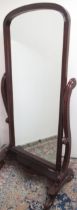 Victorian style cheval mirror, arched plate on scrolled supports and feet, H170cm W75cm