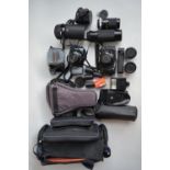 Collection of 35mm SLR cameras and accessories to include Canon A-1 with Canon 28mm and 50mm lenses,