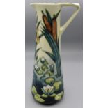 Moorcroft Pottery: Lamia pattern tall jug, tube lined with bullrushes and water lilies, dated ’95,