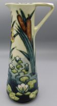 Moorcroft Pottery: Lamia pattern tall jug, tube lined with bullrushes and water lilies, dated ’95,