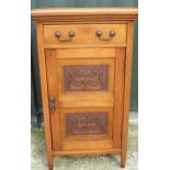 C20th walnut side cabinet, single drawer above a door carved with Art Nouveau foliage, on square