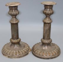 Pair of Sheffield plate telescopic candle sticks on circular gadrooned bases, maximum H25cm