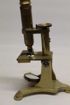 J.B. Dancer Manchester - C19th lacquered brass microscope on cast triform base bearing makers