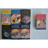 Seven hardback Harry Potter books by J K Rowling to include 6 first editions, (1 x Order Of The