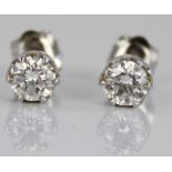 18ct white gold diamond stud earrings, each set with single round cut diamond, stamped 750, 1.5g,