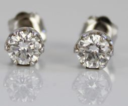 18ct white gold diamond stud earrings, each set with single round cut diamond, stamped 750, 1.5g,