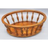 Early C20th wooden oval openwork bread basket, base inlaid with fan and star and with baluster