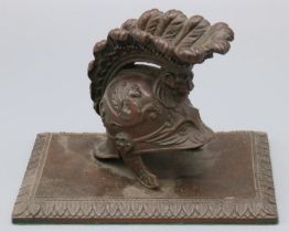 Regency style cast patinated bronze paperweight in the form of a Centurion helmet with plume, on