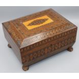 Victorian Tunbridgeware rosewood sarcophagus shaped sewing box, the hinged cover opening to reveal a