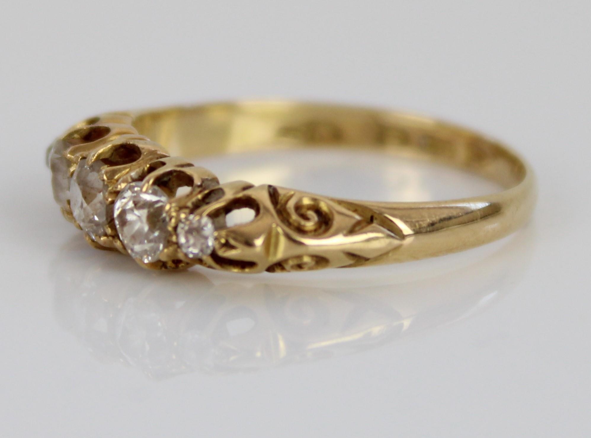 18ct yellow gold five stone diamond ring, the round cut graduating diamonds in claw settings, on - Image 2 of 2