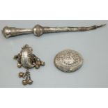 Early C20th foreign white metal Torah pointer, decorated with scrollwork and stylised foliage,