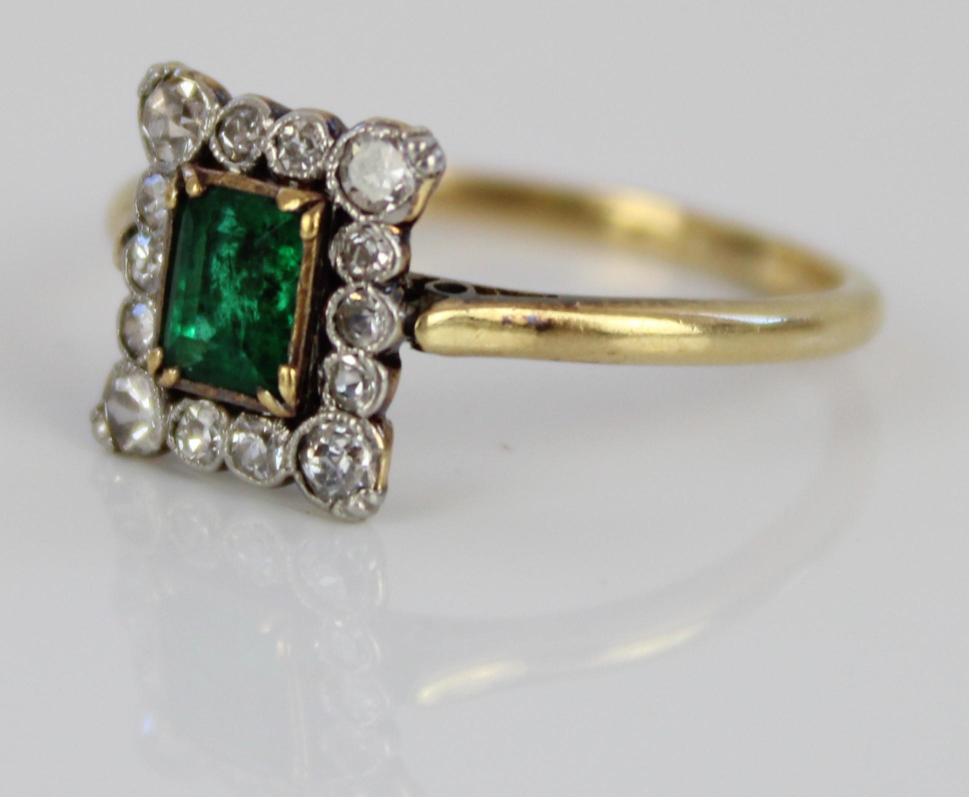 18ct yellow gold and platinum cluster ring, the central emerald cut emerald in claw setting, - Image 2 of 2