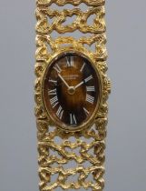 Universal Geneve - late 1960's lady's 18ct gold hand wound cocktail wristwatch, signed Roman Tiger's