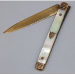 C19th continental soft fruit knife with 8.5cm folding gold blade and mother of pearl handle with