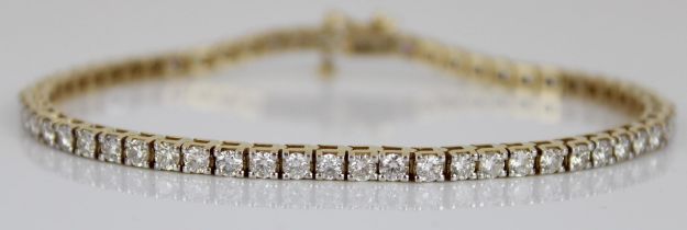 14ct yellow gold tennis bracelet, set with approx.60 brilliant cut diamonds, stamped 14k, L20.5cm,