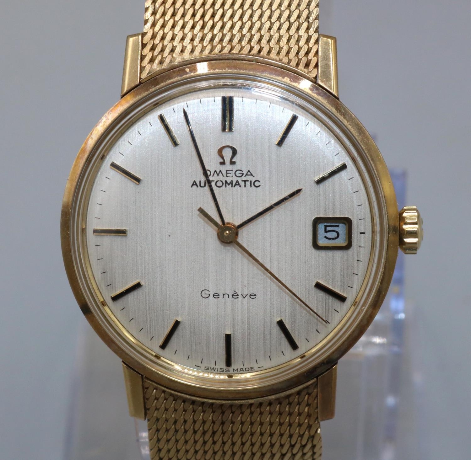Omega Geneve 9ct gold automatic wristwatch with date, signed silvered dial with applied baton
