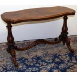 Victorian figured walnut centre table, quarter veneered shaped oval top on lobed baluster supports