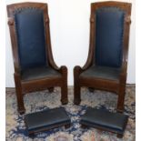 Pair of C20th Gothic Revival oak throne type chairs, moulded frames with angular arched backs,