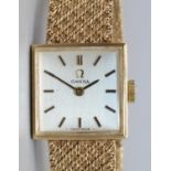 Omega - lady's 9ct gold hand wound wristwatch, signed silvered dial with applied baton hour indices,