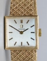 Omega - lady's 9ct gold hand wound wristwatch, signed silvered dial with applied baton hour indices,