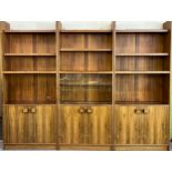 Robert & George Ingham Thirsk - a 1970's teak and rosewood three section wall unit, with