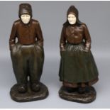 Paul D'Aire (French early C20th); Pair of green and brown patinated bronze and ivory figures of