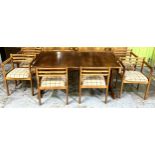 Robert & George Ingham of Thirsk, a 1970's teak and rosewood extending dining table, rectangular top