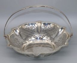George V hallmarked silver circular cake basket, with geometrically pierced tapering sides and