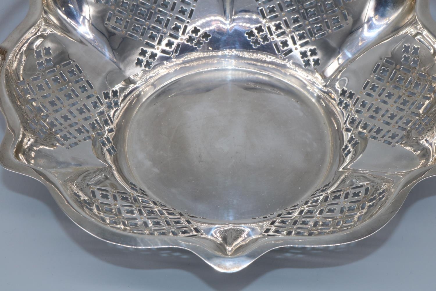 George V hallmarked silver circular cake basket, with geometrically pierced tapering sides and - Image 2 of 3
