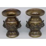 Pair of Japanese Meiji bronze two handled vases, bodies relief decorated with birds, H12cm (2)