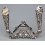 Victorian hallmarked silver easel menu stand, the pierced scrolling stand with two posy holders,