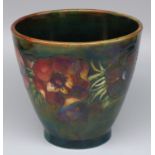 Moorcroft Pottery: Anemone pattern cache pot, tubelined lustre decoration of red flowers on dark