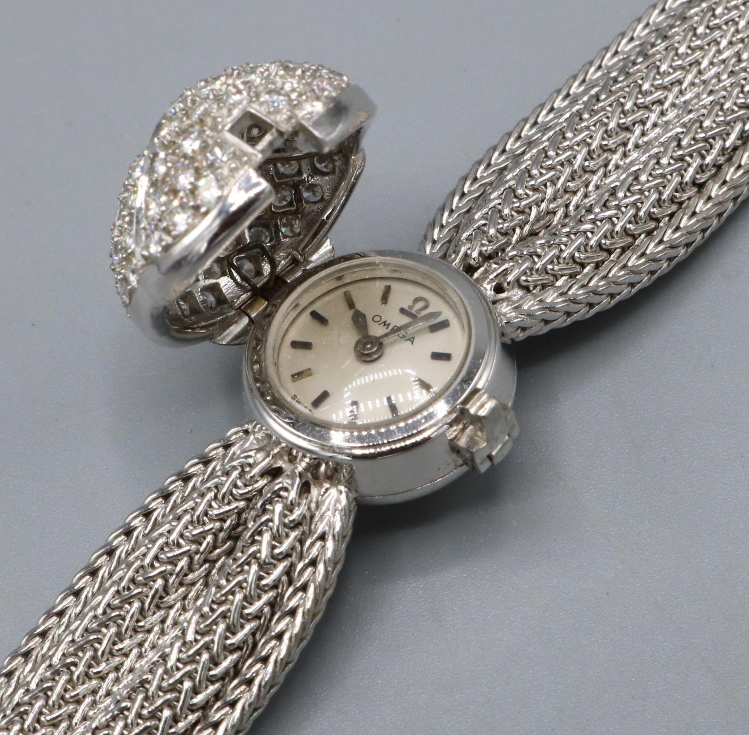 Omega - late 1960's lady's 18ct white gold and diamond set hand wound cocktail wristwatch, signed